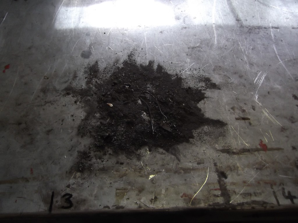 A small amount of the sand and debris removed from the new block when cleaning prior to building up the engine