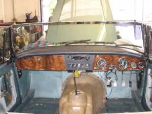 Continuing fitting up - dash back in place and new blue trim going in