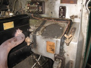 Derby Bentley 4 1/4 rewire. The conduits have been stripped off showing the poor state of the wiring (some of which have been melting!)