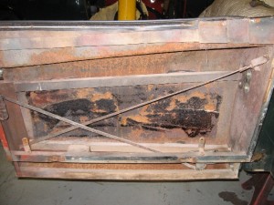 XK140 interior of door with corrosion visible